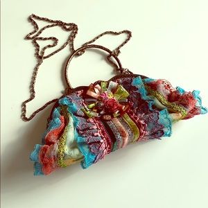 Colourful lace clutch bag by Rose Garden